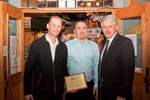 Ross McDonald and Simon Watson from Southern Discoveries with Brian Henderson, President of ITOC holding their Operator of the Year 2011 award